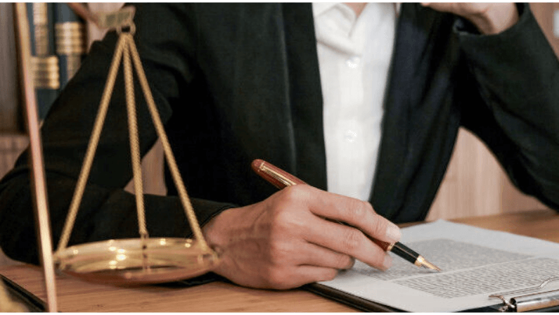 A lawyer reviewing a document for a foreclosure house