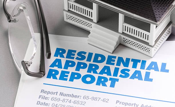 Appraisal Report with house and pen.