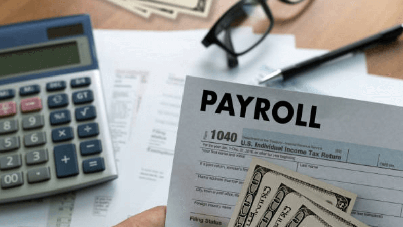 a person showing his pay check