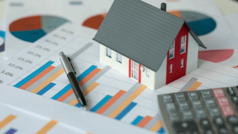 a person calculating the interest or the monthly payment he has to pay for his mortgage