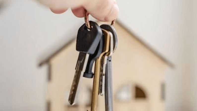 A man holding a key