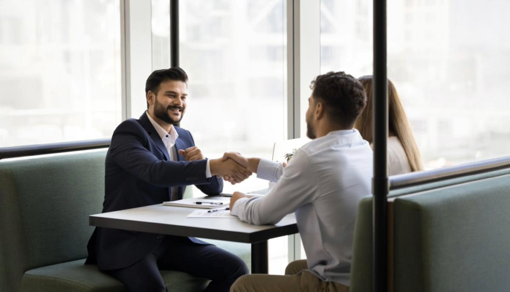 Couple learning about private mortgage qualification