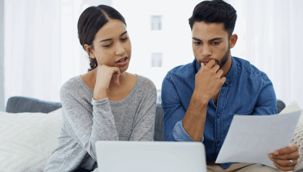 Couple in Ontario reviewing mortgage payment deferral options