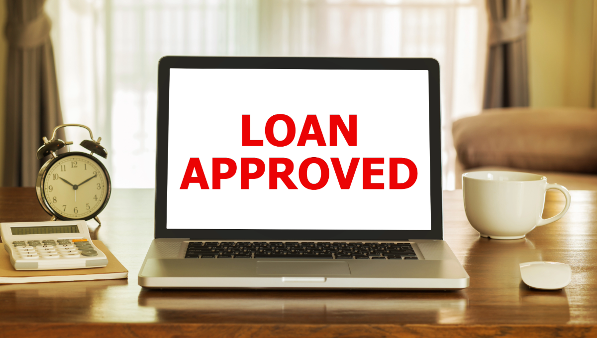 Digital online mortgage and home equity loan approval on a laptop